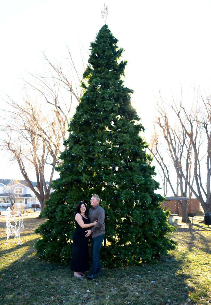 pregnancy photos pregnant couple unique black and white artistic cute couple christmas winter tree light 